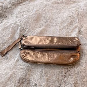Fossil shimmering bronze clutch with wristlet strap